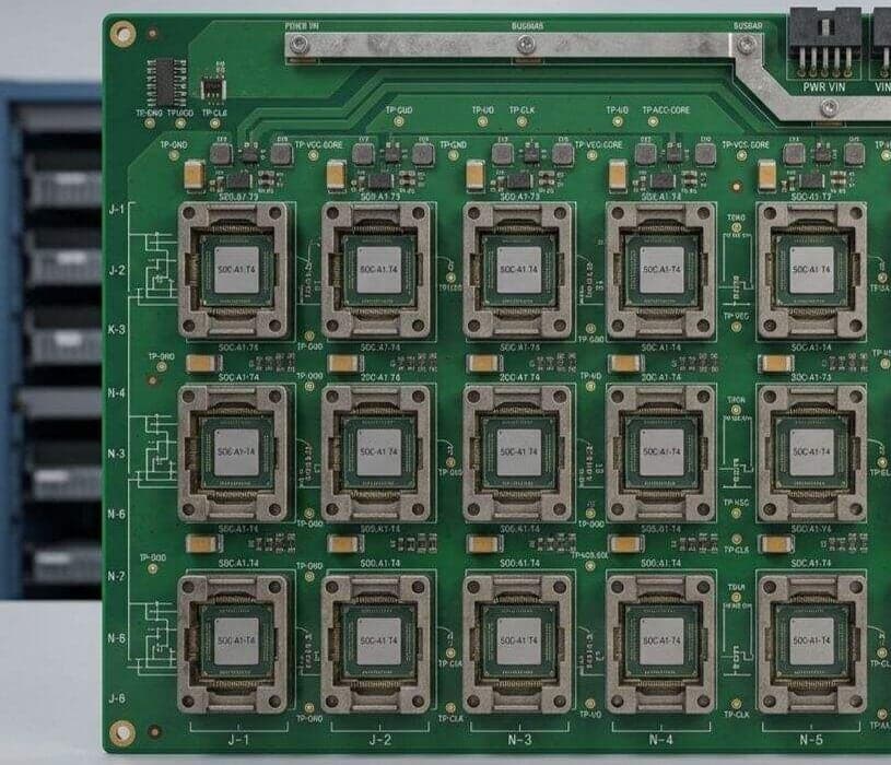 IC burn-in board with rows of device test sockets, illustrative